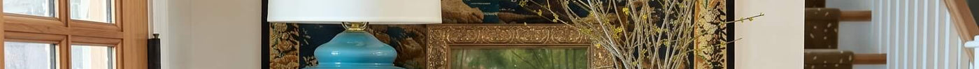 How to Decorate the Wall Above Your Fireplace or Entranceway Table